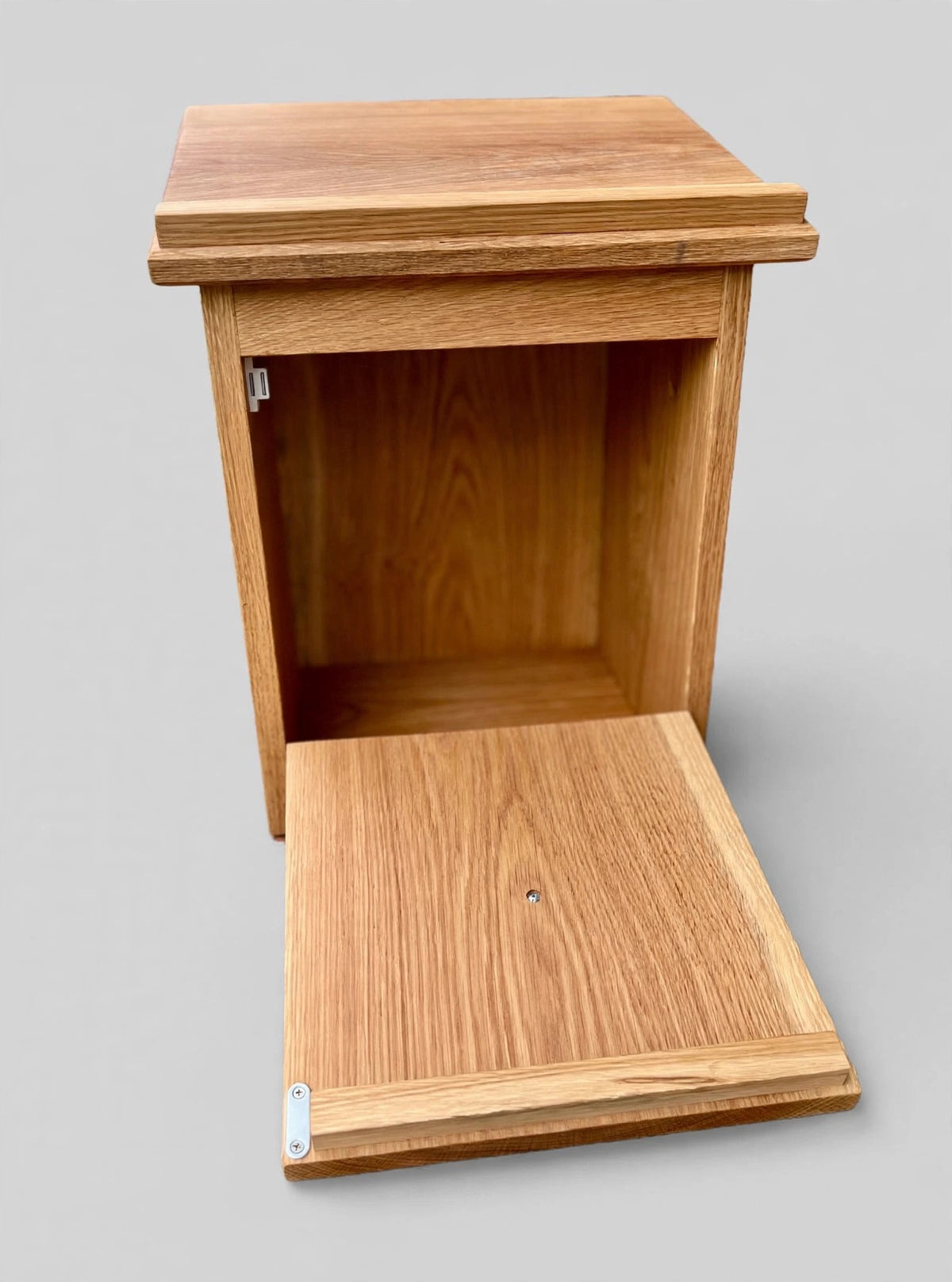 Open cabinet-style white oak shtender displaying interior storage space for Seforim and prayer books