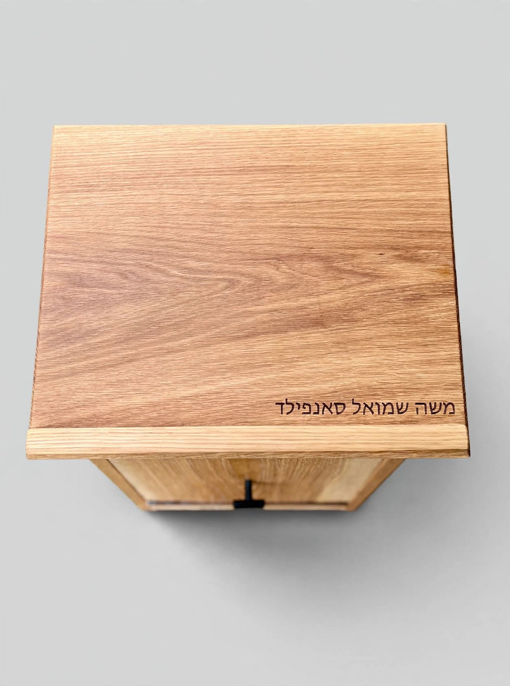 Personalised solid white oak shtender with custom laser-engraved Hebrew name on reading surface